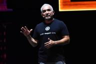 The Dog Trainer Cesar Millan speaks on stage during his show 