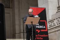 New York, New York - AUGUST 19: American writer and film director Paul Auster reads a passage from author Salman Rushdie