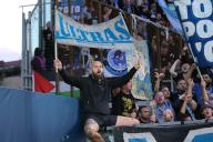 Italy, Bergamo, may 9 2024: fans of O. Marseille wave the flags and show banners in the stands during soccer game Atalanta BC vs O. Marseille, Europa League Semi-Final 2nd Leg Gewiss Stadium Atalanta BC vs Olympique de Marseille - Semi-Final 2nd Leg Europa League 2023/2024 at Gewiss Stadium (Photo by Fabrizio Andrea Bertani/Pacific Press