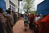 A Kashmiri woman walks out of polling station after casting her vote during the fourth phase of voting in India