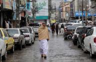 QUETTA, PAKISTAN, APR 25: Commuters are passing through a road during downpour, in Quetta on Thursday, April 25, 2024. (Sami Khan\/PPI Images