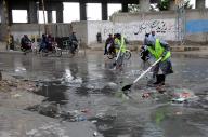 QUETTA, PAKISTAN, APR 25: Workers of Quetta Metropolitan Corporation (QMC) are busy in cleaning and draining the stagnant rainwater after heavy downpour under the supervision of Muhammad Hamza Shafqat, Commissioner Quetta and Administrator Quetta, at Double road in Quetta on Thursday, April 25, 2024. (Sami Khan\/PPI Images