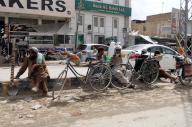 QUETTA, PAKISTAN, APR 26: Unemployed labors are sitting worried at a roadside as they are waiting for their employment, at Old Adda in Quetta on Friday, April 26, 2024. (Sami Khan\/PPI Images