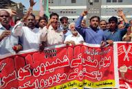 SUKKUR, PAKISTAN, MAY 01: Members of All Pakistan WAPDA Hydro Workers Union are holding rally as they are presenting tribute to martyrs of Chicago on the occasion of International Labour Day, in Sukkur on Wednesday, May 1, 2024. (Shahid Ali\/PPI Images