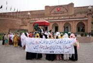 PESHAWAR, PAKISTAN, MAY 09: Members of different organizations are holding protest rally against May 9 riots and expressed their solidarity with Pakistan Armed Forces, at Balahisar Fort in Peshawar on Thursday, May 9, 2024. The government has decided to mark May 9 as black day on Thursday (today) in commemoration of the first anniversary of the violence against military installations throughout the country. (Fahad Pervez\/PPI Images