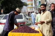 QUETTA, PAKISTAN, MAY 16: Vendor sells Falsa (Grewia Asiatica) to earn his livelihood for support his family, on his pushcart at a roadside located on Court road in Quetta on Thursday, May 16, 2024. (Sami Khan/PPI Images
