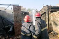 MULTAN, PAKISTAN, MAY 18: Fire fighters extinguishing fire during rescue operation after fire broke out incident, at Wood Market in Multan on Saturday, May 18, 2024. (Abdul Sattar/PPI Images