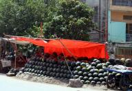 LAHORE, PAKISTAN, MAY 18: Watermelons are being selling at roadside stall as demand of watermelons fruits increased in city during hot summer season, in Lahore on Saturday, May 18, 2024. (Babar Shah/PPI Images