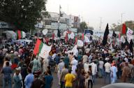 KARACHI, PAKISTAN, JUN 03: Activists of Mohajir Qaumi Movement (MQM-H) block road as they are holding protest demonstration against prolong electricity load shedding in city during the hot weather of summer season, at M.A Jinnah road in Karachi on Monday, June 3, 2024. (S.Imran Ali/PPI Images