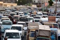 KARACHI, PAKISTAN, JUN 03: A large number of vehicles stuck in traffic jam due to protest demonstration of Mohajir Qaumi Movement (MQM-H) against prolong electricity load shedding in city during the hot weather of summer season, at M.A Jinnah road in Karachi on Monday, June 3, 2024. (S.Imran Ali/PPI Images