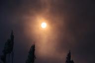 KHARKIV, UKRAINE - MAY 4, 2024 - Smoke covers the sun during a fire following a Russian missile strike, Kharkiv, northeastern Ukraine., Credit:Vyacheslav Madiyevskyy \/ Avalon