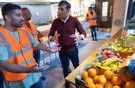 06\/05\/2024. London, United Kingdom. The Prime Minister Rishi Sunak visits Go Dharmic in Islington where he met founder Hanuman Dass, other volunteers, and helped prepare food boxes., Credit:Simon Walker \/ Avalon