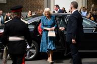 Britain\'s Queen Camilla (C) arrives at the Moreland Primary School, in London, on May 7, 2024, to open a new Coronation Library, the 50th in a series of special primary school libraries that have been transformed over the last twelve months with the