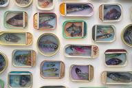 Hampstead Heath, London, UK. 8th May, 2024. Affordable Art Fair presents contemporary art from an impressive roster of local and international galleries from 15 countries, an exhibit of sardine tin art by French artist Ortaire de Coupigny covers an
