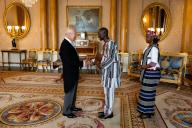 The Ambassador of Burkina Faso Leopold Tonguenoma Bonkoungou accompanied by Mamzotawinde Lucile Bonkoungou Ouedraogo, presents his credentials to King Charles III during a private audience at Buckingham Palace, London. Picture date: Thursday May 16