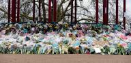 visitors pay their respects to Sarah Everard at the bandstand on Clapham Common, Sarah Everard. was killed after she disappeared in London on 3rd March after leaving a friend