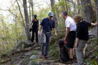 President Barack Obama and First Lady Michelle Obama have a chance encounter with other hikers while walking along a trail off the Blue Ridge Parkway outside of Asheville, N.C., April 23, 2010.