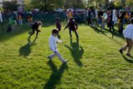 Kids participate in the 2012 White House Easter Egg Roll festivities on the South Lawn, April 9, 2012.