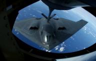 A KC-135 Stratotanker refuels a B-2 Spirit Nov. 20 over the Pacific Ocean. The B-2 and KC-135 are deployed to Andersen Air Force Base Guam for Exercise Koa Lightning. The KC-135 is assigned to the from the 121st Refueling Squadron from ...