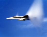 An F/A 18 Hornet from Strike Fighter Squadron 137 (VFA-137) flies faster than the speed of sound creating a sonic boom and a visual mist during an exercise off the coast of San Diego California. (Exact Date Shot Unknown)
