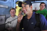Actor Kal Penn answers the phone in primary flight control and talks to a Sailor aboard the aircraft carrier USS Dwight D. Eisenhower during a USO Hollywood Handshake Tour. The Eisenhower Carrier Strike Group is underway for a regularly scheduled ...