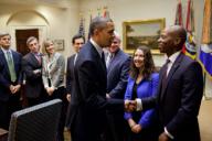 President Barack Obama greets participants In the Roosevelt Room of the White House prior to signing the Jumpstart Our Business Startups (JOBS) Act, April 5, 2012. Pictured, from left, are: Steve Case, Chairman, Startup America Partnership Board; ...