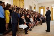 President Barack Obama talks with members of the 2012 Spring White House intern class before a group photo in the East Room of the White House, April 26, 2012.