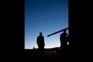 President Barack Obama stops to view the moon and Venus before boarding Marine One in Boulder, Colo., April 24, 2012.
