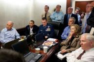President Barack Obama and Vice President Joe Biden, along with members of the national security team, receive an update on the mission against Osama bin Laden in the Situation Room of the White House, May 1, 2011. Seated, from left, are: Brigadier ...