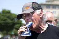 UNITED STATES - May 20: Ben Cohen, Co-founder of Ben & Jerryâs, eats an ice cream bar at an event on police reform and ending qualified immunity outside of the U.S. Supreme Court in Washington on Thursday, May 20, 2021. (Photo by Caroline Brehman/CQ Roll Call