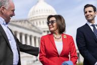 UNITED STATES - MARCH 13: Rep. Nancy Pelosi, D-Calif., Sen. Tim Kaine, D-Va., left, and Rep. Chris Deluzio, D-Pa., attend a news conference to urge the House to pass the Senate National Security Aid Package, which includes aid to Ukraine, on Wednesday, March 13, 2024. (Tom Williams/CQ Roll Call