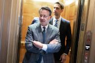 UNITED STATES - APRIL 23: Sens. Gary Peters, D-Mich., left, and Tom Cotton, R-Ark., are seen in the U.S. Capitol before the Senate passed procedural votes on the House passed foreign aid package on Tuesday, April 23, 2024. (Tom Williams\/CQ Roll Call