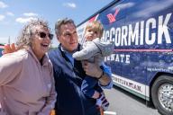 UNITED STATES - APRIL 25: Dave McCormick, Republican U.S. Senate candidate from Pennsylvania, holds 10-month-old J.D., after a campaign rally at Beerded Goat Brewery in Harrisburg, Pa., on Thursday, April 25, 2024. (Tom Williams\/CQ Roll Call