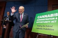 UNITED STATES - MAY 1: Senate Majority Leader Charles Schumer, D-N.Y., and Sen. Cory Booker, D-N.J., conduct a news conference on reintroduction of the "Cannabis Administration and Opportunity Act (CAOA)," in Capitol Visitor Center on Wednesday, May 1, 2024. The legislation would remove cannabis from the Controlled Substances Act, among other actions. (Tom Williams\/CQ Roll Call