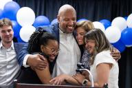 UNITED STATES - MAY 14: Harry Dunn, Democratic candidate for Marylandâs 3rd Congressional District, hugs his staff after conceding the race to State Sen. Sarah Elfreth, at VFW Post 7472 on the state primary election day in Ellicott City, Md., on Tuesday, May 14, 2024. (Tom Williams/CQ Roll Call