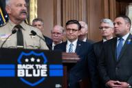 UNITED STATES - MAY 15: Speaker of the House Mike Johnson, R-La., center, listens to Sheriff Chad Bianco of Riverside County, Calif., speak during a news conference in the U.S. Capitol to recognize law enforcement as part of Police Week on Wednesday, May 15, 2024. (Tom Williams\/CQ Roll Call
