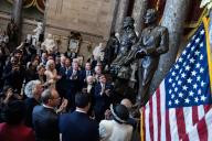 UNITED STATES - MAY 16: Speaker of the House Mike Johnson, R-La., the North Carolina delegation, and family members of Rev. Billy Graham, unveil Grahamâs statue during the dedication ceremony in the U.S. Capitolâs Statuary Hall on Thursday, May 16, 2024. (Tom Williams/CQ Roll Call