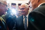 UNITED STATES - MAY 16: Former Vice President Mike Pence talks with Reps. Harold Rogers, R-K.Y., left, and Steve Womack, R-Ark., right, during the unveiling ceremony for the statue of Rev. Billy Graham in the U.S. Capitolâs Statuary Hall on Thursday, May 16, 2024. (Tom Williams/CQ Roll Call