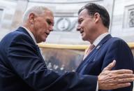 UNITED STATES - MAY 16: Former Vice President Mike Pence, left, talks with Rep. Tom Suozzi, D-N.Y., after the unveiling ceremony for the statue of Graham in the U.S. Capitol on Thursday, May 16, 2024. (Tom Williams\/CQ Roll Call