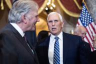 UNITED STATES - MAY 16: Former Vice President Mike Pence, talks with Rev. William Franklin Graham III, left, the son Rev. Billy Graham, during the statue unveiling ceremony for the elder Graham in the U.S. Capitolâs Statuary Hall on Thursday, May 16, 2024. (Tom Williams/CQ Roll Call