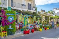 View of colourful cafe and restaurant in Kos Town, Kos, Dodecanese, Greek Islands, Greece, Europe