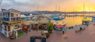 View of golden sunset, boats and restaurants at Knysna Waterfront, Knysna, Western Cape Province, South Africa, Africa