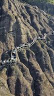 Tourists climbing up a steep mountain, Wuyi Mountains, UNESCO World Heritage Site, Fujian, China, Asia