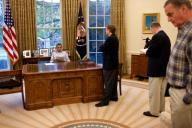 President Barack Obama meets with, from left, NSC Senior Director for Russian Affairs Mike McFaul, Deputy National Security Advisor Tom Donilon, and National Security Advisor Gen. Jim Jones, before a phone call with Russian President Dmitry Medvedev ...