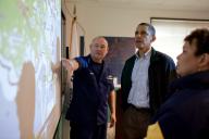 U.S. Coast Guard Commandant Admiral Thad Allen, left, who is serving as the National Incident Commander, and EPA Administrator Lisa Jackson, right, brief President Barack Obama about the situation along the Gulf Coast following the BP oil spill, at ...