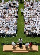 First Lady Michelle Obama addresses hundreds of chefs from around the country during a âLetâs Move!â event on the South Lawn of the White House, June 4, 2010. The First Lady called on chefs to get involved by adopting a school and working ...