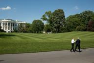 President Barack Obama walks along the South Lawn Drive of the White House, with Sen. John Kerry, D-Mass., May 5, 2010. (Pete Souza/ PSG)