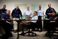 President Barack Obama is briefed about the situation along the Gulf Coast following the BP oil spill, at the Coast Guard Venice Center, in Venice, La., Sunday, May 2, 2010. Pictured, from left, are U.S. Coast Guard Commandant Admiral Thad Allen, ...