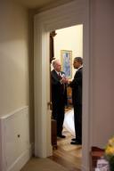 President Barack Obama talks with Assistant to the President for Homeland Security and Counterterrorism John Brennan in the Oval Office, May 24, 2010. (Pete Souza/ PSG)