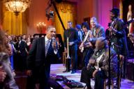 President Obama joins in singing ÒSweet Home ChicagoÓ during the ÒIn Performance at the White House: Red, White and BluesÓ concert in the East Room of the White House, Feb. 21, 2012. Participants include, from left: Troy ÒTrombone ShortyÓ Andrews, ...